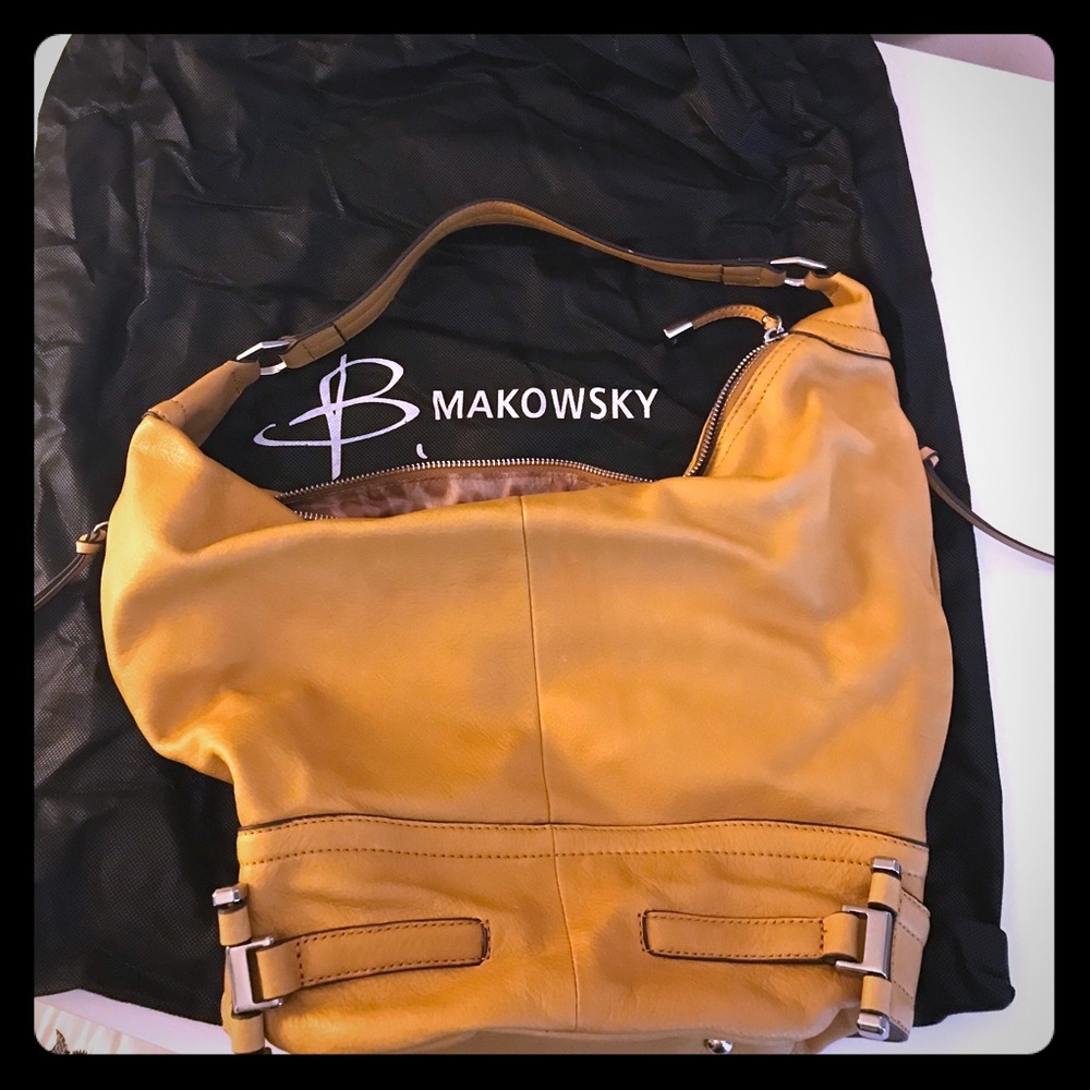 B. Makowsky mustard color hobo bag